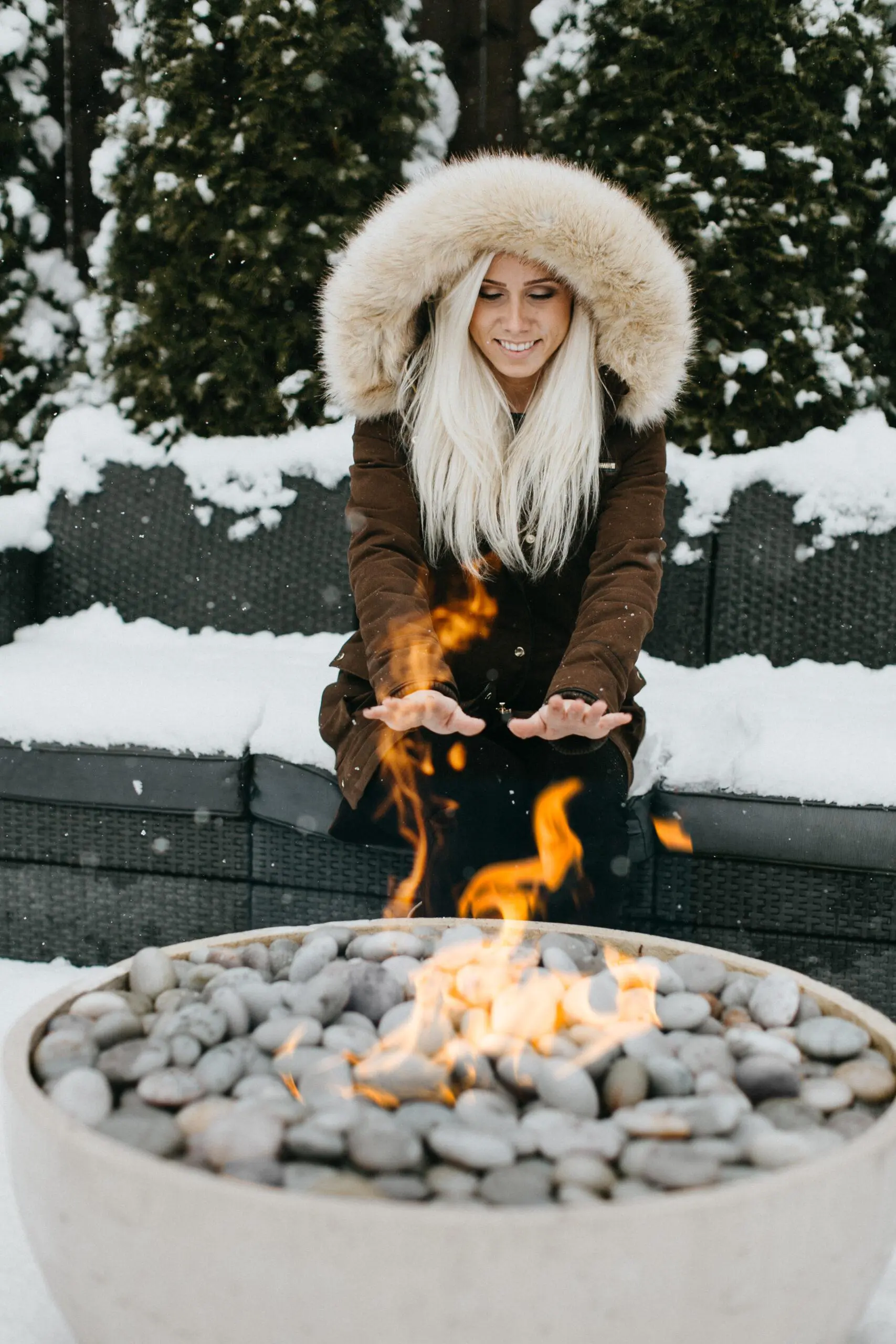 Enjoying fire table in the winter