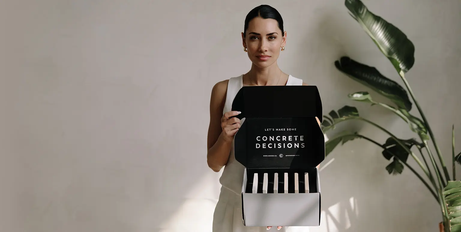 Woman holding sample box